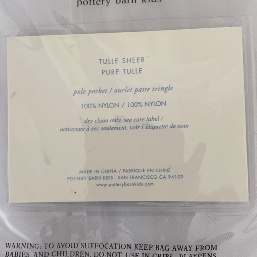 Pottery barn sheer tulle drapes. Still in package